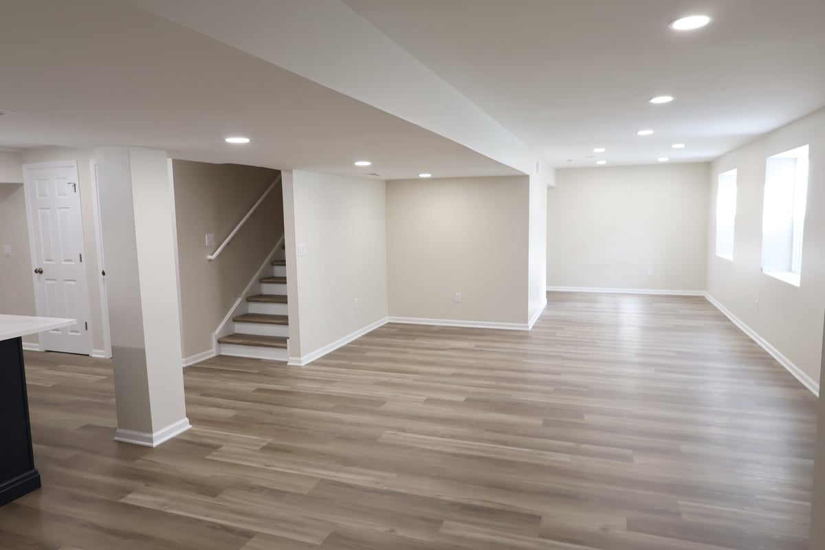 Basement stairway leading into open living space in Clear Contractors’ custom home in Crown Point, IN