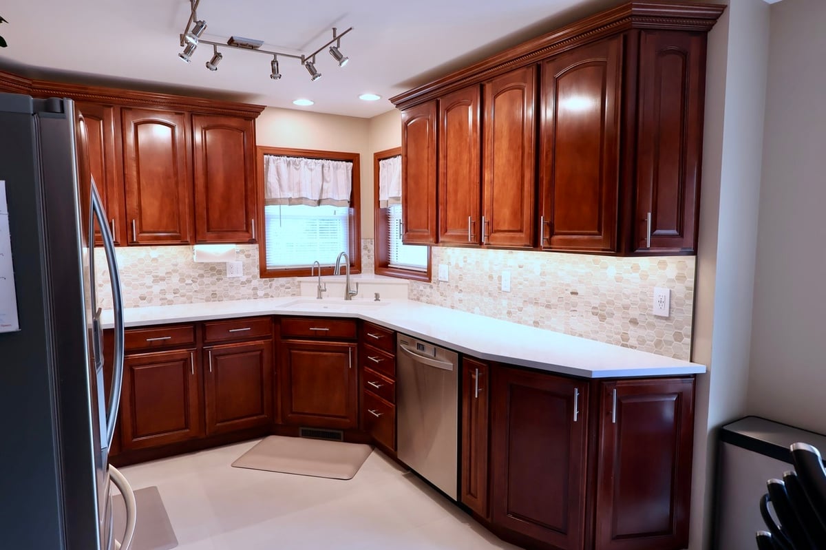 Kitchen update in Lowell with L-shaped layout and cherry wood cabinets